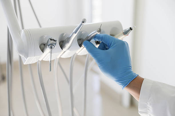 Professional Tooth Extraction technician working in Seco Mines, TX
